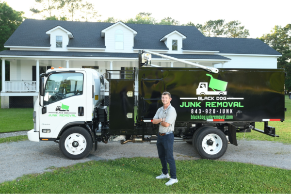 Man with Black Dog Junk Truck 3/3