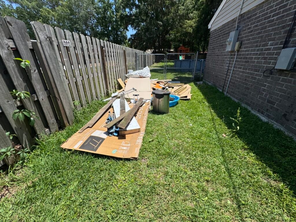 Backyard clutter with construction debris