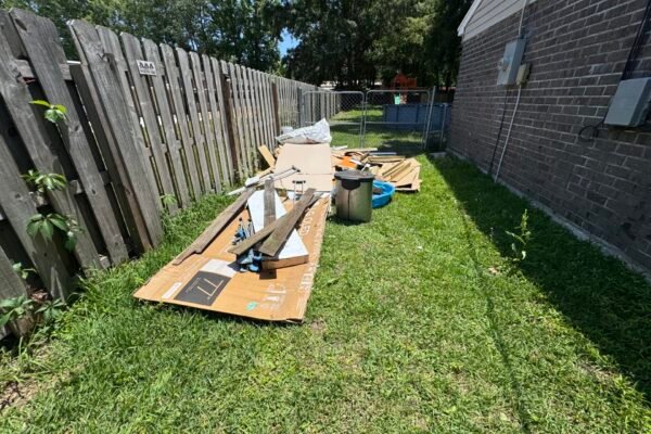Backyard clutter with construction debris