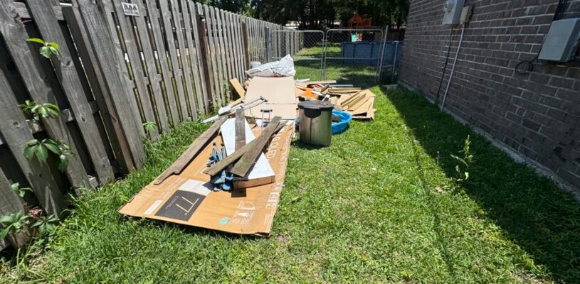 Backyard clutter with construction debris