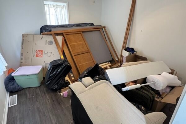 a cluttered apartment room.