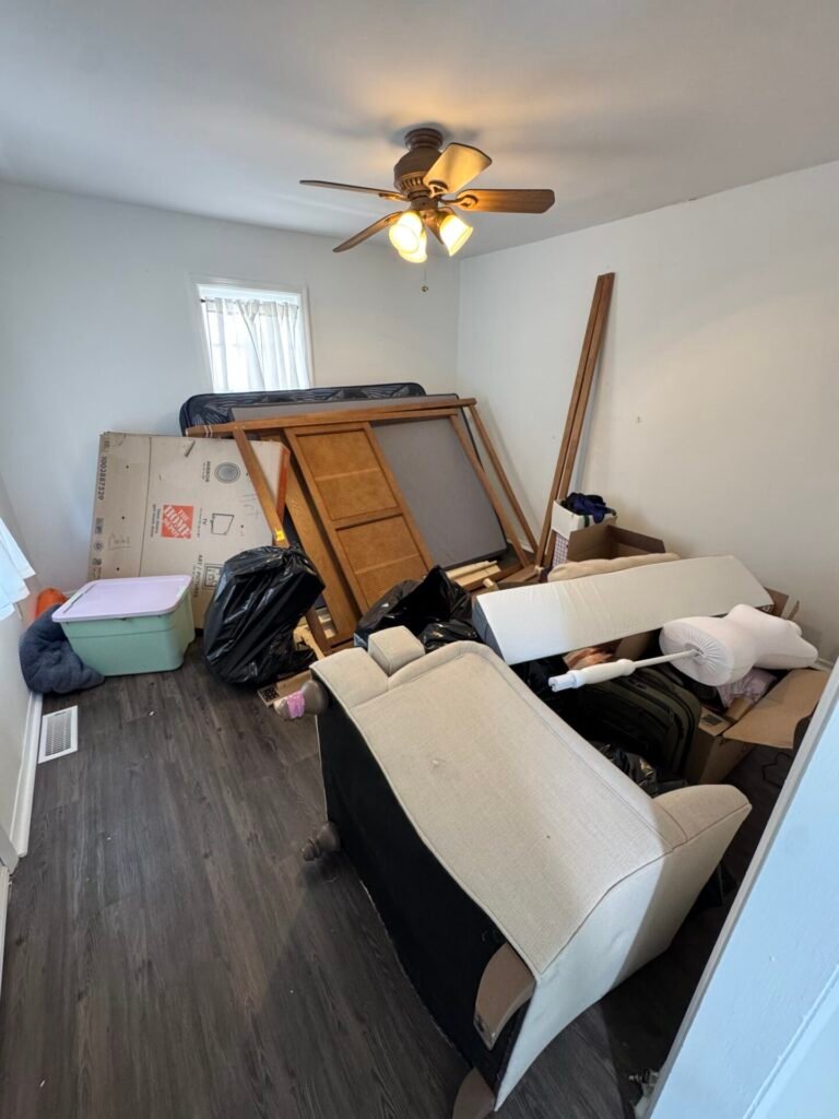 a cluttered apartment room.