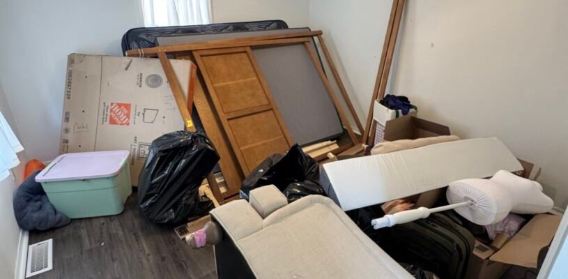 a cluttered apartment room.