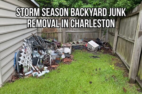 Backyard clutter and debris piled near a fence and house before storm season yard junk removal in Charleston.
