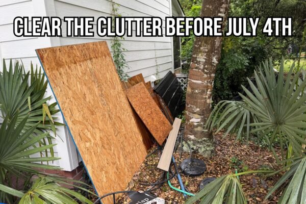 Black Dog Junk Removal crew hauling items for junk removal before July 4th in Charleston