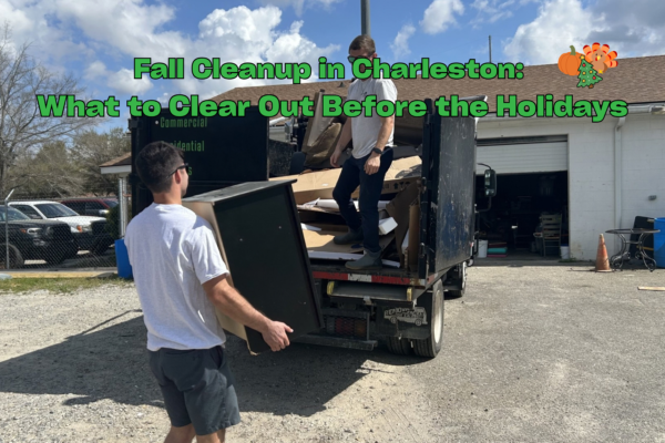 Black Dog Junk Removal crew loading furniture during a fall cleanup in Charleston